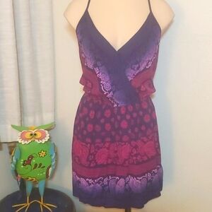 Xhilaration Romper 3 straps in back NWOT purples and pink on navy blue